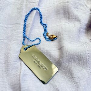 Coach metal tag necklace/bag charm